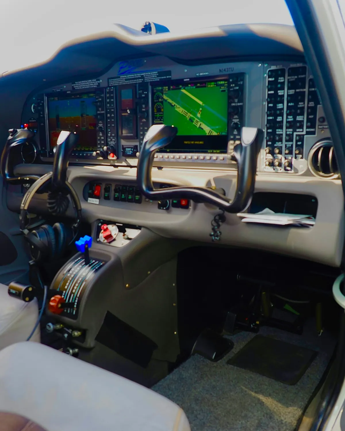 Flight deck with yokes and glass displays